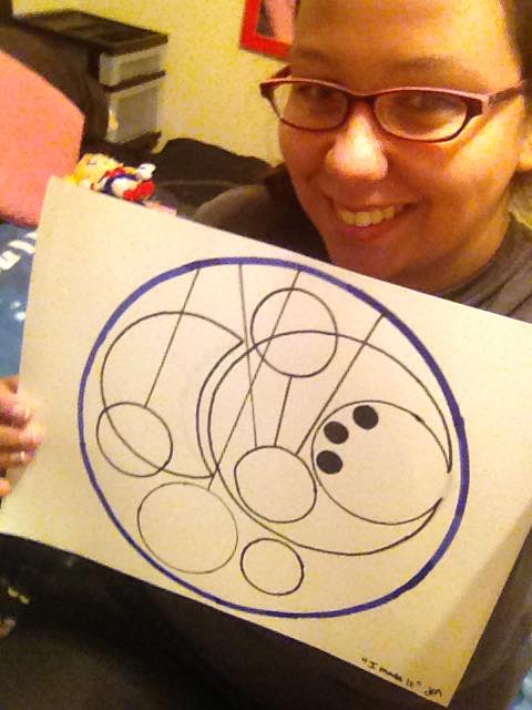 My Gallifreyan isn't perfect, but this translates to "I Made It"